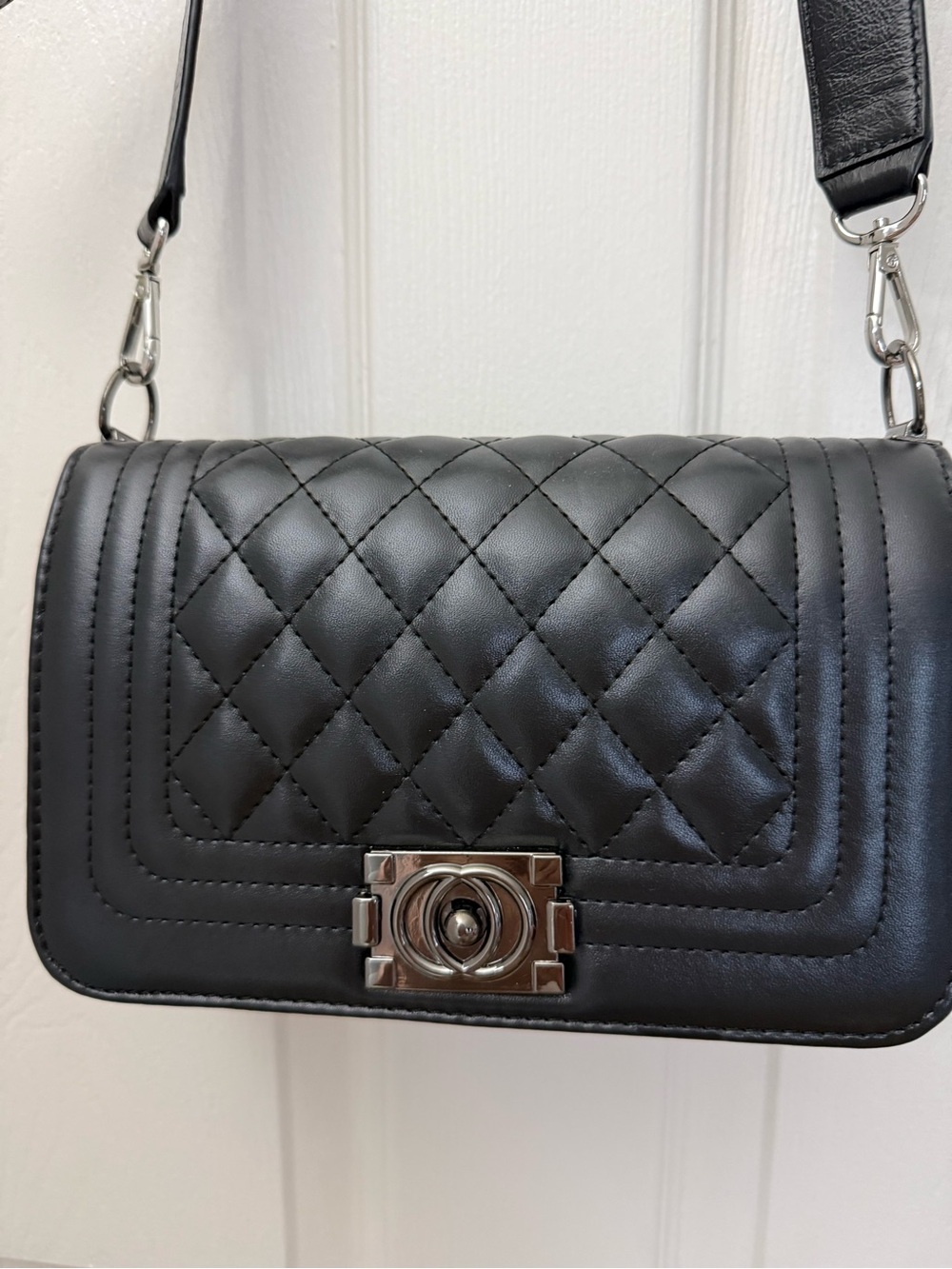 DKNY Quilted Black Leather Crossbody Bag with Silver Hardware and Red Interior